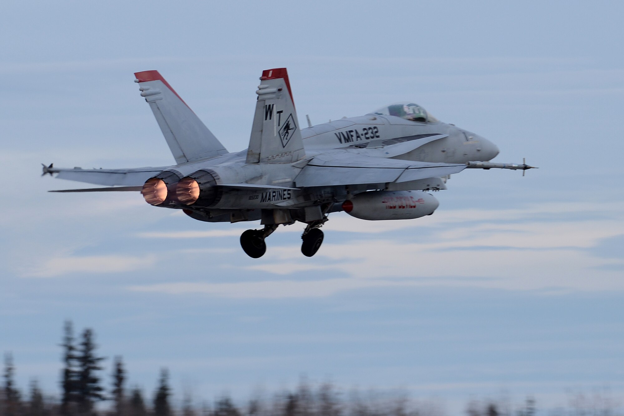 A U.S. Marine Corps F/A-18C Hornet aircraft from Marine Fighter Attack Squadron 232 out of Marine Corps Air Station Miramar, Calif., takes off from Eielson Air Force Base, Alaska, Oct. 10, 2016, for the first RED FLAG-Alaska (RF-A) 17-1 combat training mission. This exercise provides unique opportunities to integrate various forces into joint, coalition and multilateral training from simulated forward operating bases. (U.S. Air Force photo by Master Sgt. Karen J. Tomasik)