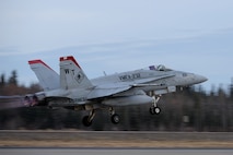A U.S. Marine Corps F/A-18C Hornet aircraft from Marine Fighter Attack Squadron 232 out of Marine Corps Air Station Miramar, Calif., takes off from Eielson Air Force Base, Alaska, Oct. 10, 2016, for the first RED FLAG-Alaska (RF-A) 17-1 combat training mission. RF-A enables joint and international units to sharpen their combat skills by flying simulated combat sorties in a realistic threat environment, which allows them to exchange tactics, techniques and procedures while improving interoperability. (U.S. Air Force photo by Master Sgt. Karen J. Tomasik)