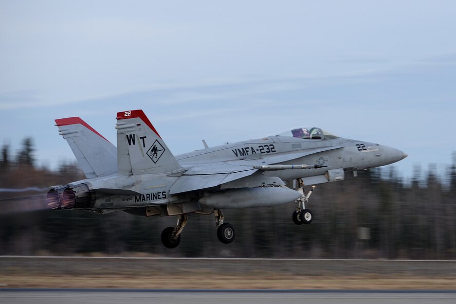 A U.S. Marine Corps F/A-18C Hornet aircraft from Marine Fighter Attack Squadron 232 out of Marine Corps Air Station Miramar, Calif., takes off from Eielson Air Force Base, Alaska, Oct. 10, 2016, for the first RED FLAG-Alaska (RF-A) 17-1 combat training mission. RF-A enables joint and international units to sharpen their combat skills by flying simulated combat sorties in a realistic threat environment, which allows them to exchange tactics, techniques and procedures while improving interoperability. (U.S. Air Force photo by Master Sgt. Karen J. Tomasik)