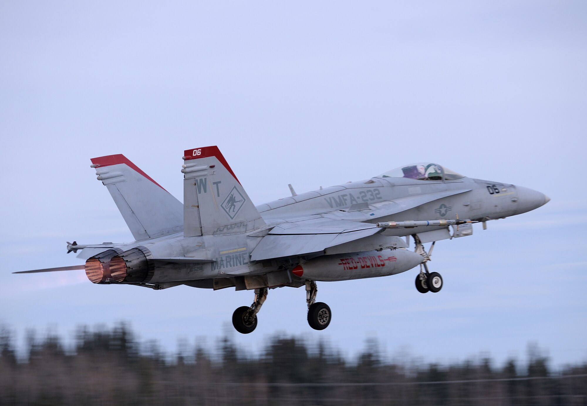 A U.S. Marine Corps F/A-18C Hornet aircraft from Marine Fighter Attack Squadron (VMFA) 232 out of Marine Corps Air Station Miramar, Calif., takes off from Eielson Air Force Base, Alaska, Oct. 10, 2016, for the first RED FLAG-Alaska (RF-A) 17-1 combat training mission. RF-A is a series of Pacific Air Forces commander-directed field training exercises for U.S. and partner nation forces, which enables U.S. Marines in units like VMFA-232 to prepare for future combat and contingency operations in a realistic threat environment inside the Joint Pacific Alaska Range Complex. (U.S. Air Force photo by Master Sgt. Karen J. Tomasik)
