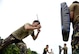 A Philippine Air Force military police office participates in baton practice, a nonlethal means of subduing an aggressor, during a subject matter expert exchange with the United States as part of the current iteration of U.S. Pacific Command’s Air Contingent at Brigadier General Benito N Ebuen Air Base, Lapu-Lapu City, Philippines, Oct. 4, 2016. The Air Contingent is helping build the capacity of the Philippine Air Force and increases joint training, promotes interoperability and provides greater and more transparent air and maritime situational awareness to ensure safety for military and civilian activities in international waters and airspace. Its missions include air and maritime domain awareness, personnel recovery, combating piracy, and assuring access to the air and maritime domains in accordance with international law. (U.S. Air Force photo by Capt. Mark Lazane)