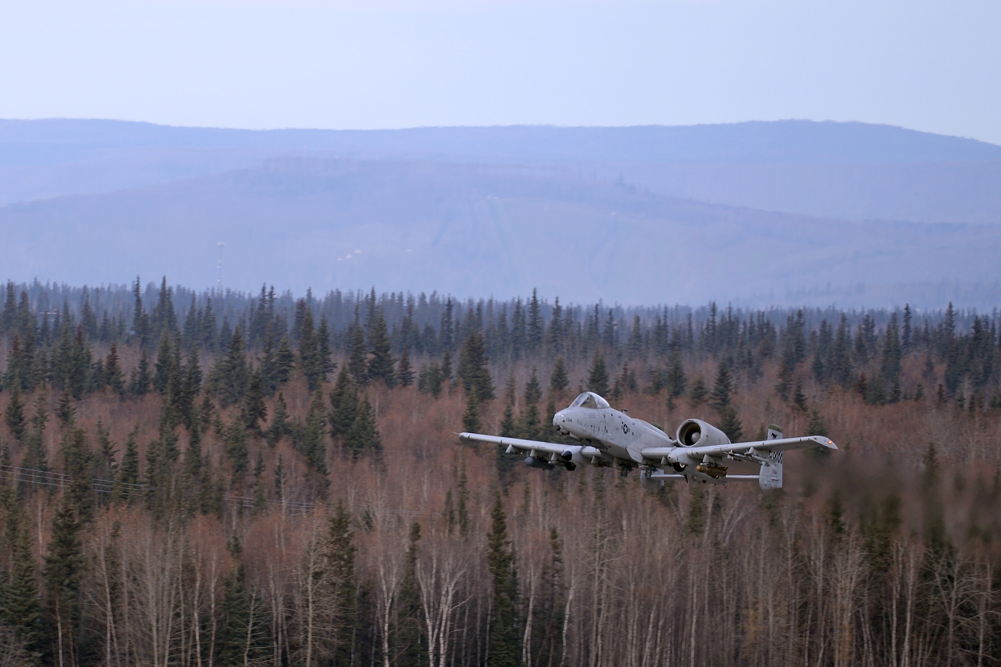 A U.S. Air Force A-10 Thunderbolt II attack aircraft assigned to the 25th Fighter Squadron out of Osan Air Base, Republic of Korea, takes off from Eielson Air Force Base, Alaska, Oct. 10, 2016, during the first combat training mission of RED FLAG-Alaska (RF-A) 17-1. RED FLAG training in Alaska signifies continued commitment to the Indo-Asia-Pacific region through a series of Pacific Air Forces commander-directed field training exercises for U.S. and partner nation forces, enabling joint and international units to sharpen their combat skills by flying simulated combat sorties in a realistic threat environment inside the Joint Pacific Alaska Range Complex. (U.S. Air Force photo by Master Sgt. Karen J. Tomasik)