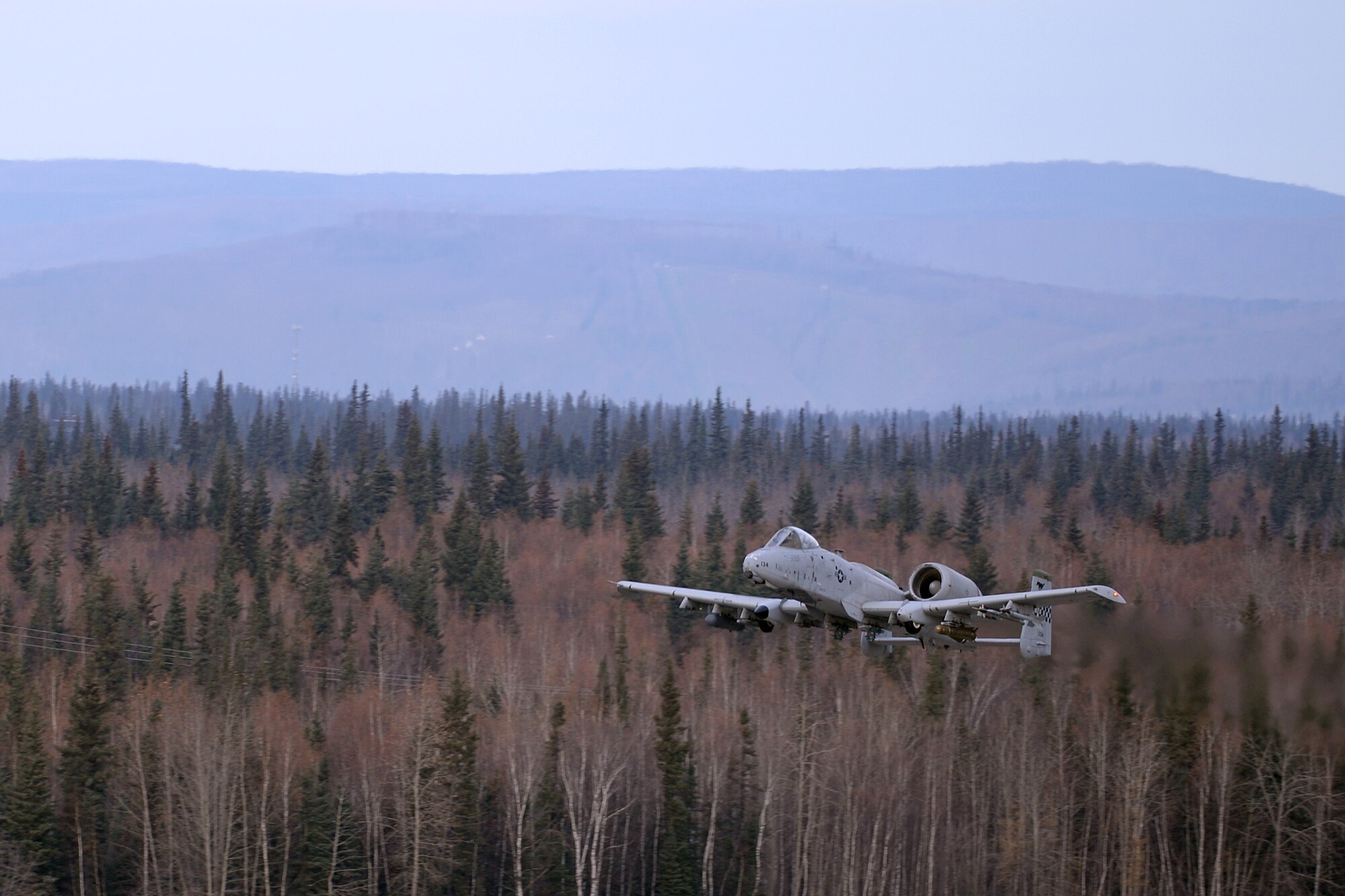 A U.S. Air Force A-10 Thunderbolt II attack aircraft assigned to the 25th Fighter Squadron out of Osan Air Base, Republic of Korea, takes off from Eielson Air Force Base, Alaska, Oct. 10, 2016, during the first combat training mission of RED FLAG-Alaska (RF-A) 17-1. RED FLAG training in Alaska signifies continued commitment to the Indo-Asia-Pacific region through a series of Pacific Air Forces commander-directed field training exercises for U.S. and partner nation forces, enabling joint and international units to sharpen their combat skills by flying simulated combat sorties in a realistic threat environment inside the Joint Pacific Alaska Range Complex. (U.S. Air Force photo by Master Sgt. Karen J. Tomasik)