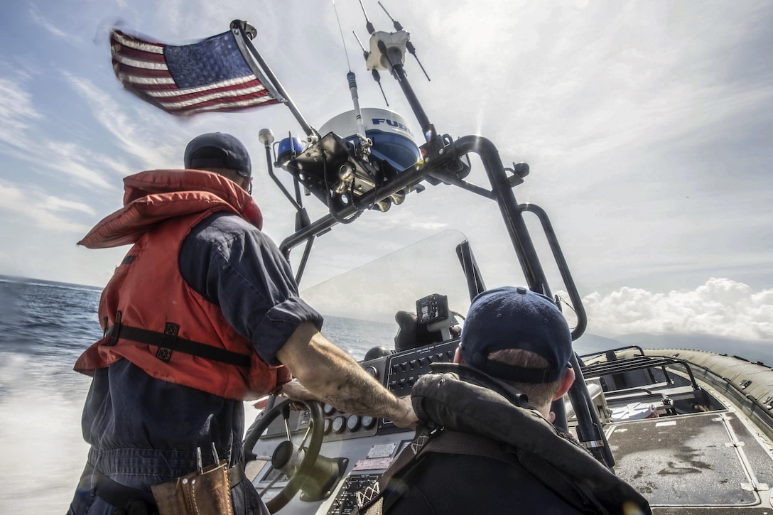 Navy Petty Officer 2nd Class William Holland drives an inflatable boat during operations with the USS Mesa Verde in the Caribbean Sea, Oct. 10, 2016, as part of relief efforts in Haiti following Hurricane Matthew. Navy photo by Petty Officer 2nd Class Ridge Leoni