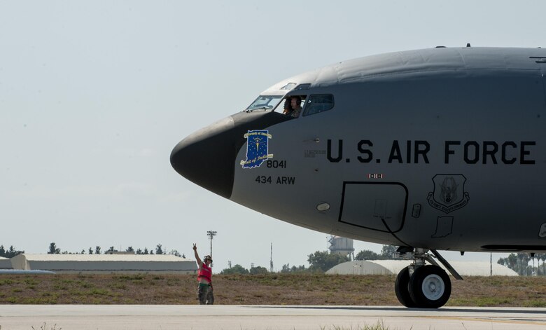 U.S. Air Force Tech. Sgt. Jason, 912th Air Refueling Squadron crew chief, stands watching a KC-135 Stratotanker after marshalling it onto the taxiway for its flight Sept. 19, 2016, at Incirlik Air Base, Turkey. One of a crew chiefs responsibilities is to guide aircraft safely onto the taxiway. (U.S. Air Force photo by Staff Sgt. Jack Sanders)