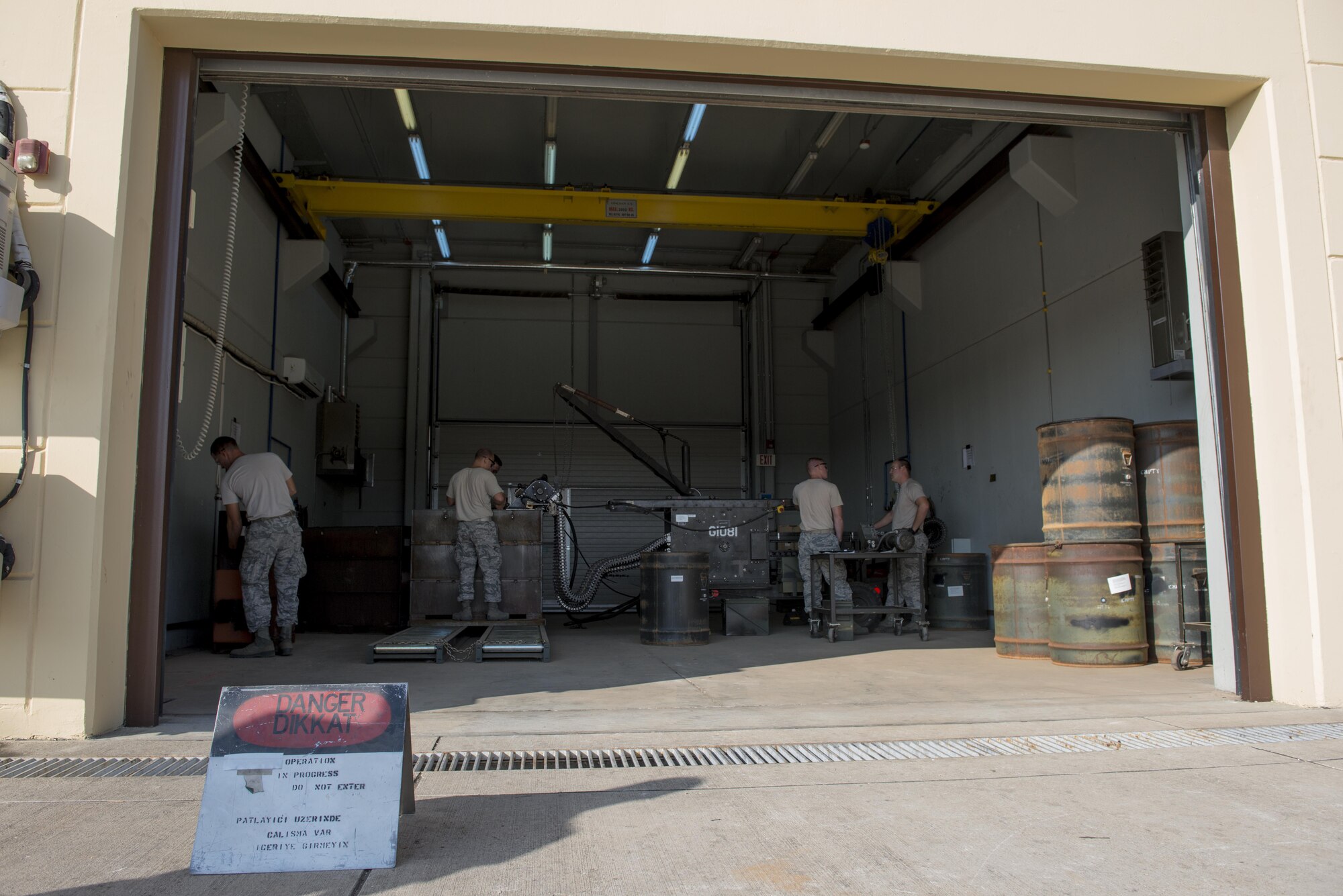 U.S. Airmen assigned to the 447th Expeditionary Aircraft Maintenance Squadron process 30mm rounds on a conveyer belt Sept. 8, 2016, at Incirlik Air Base, Turkey. The rounds are accounted for, secured and stored for future use. (U.S. Air Force photo by Senior Airman John Nieves Camacho)
