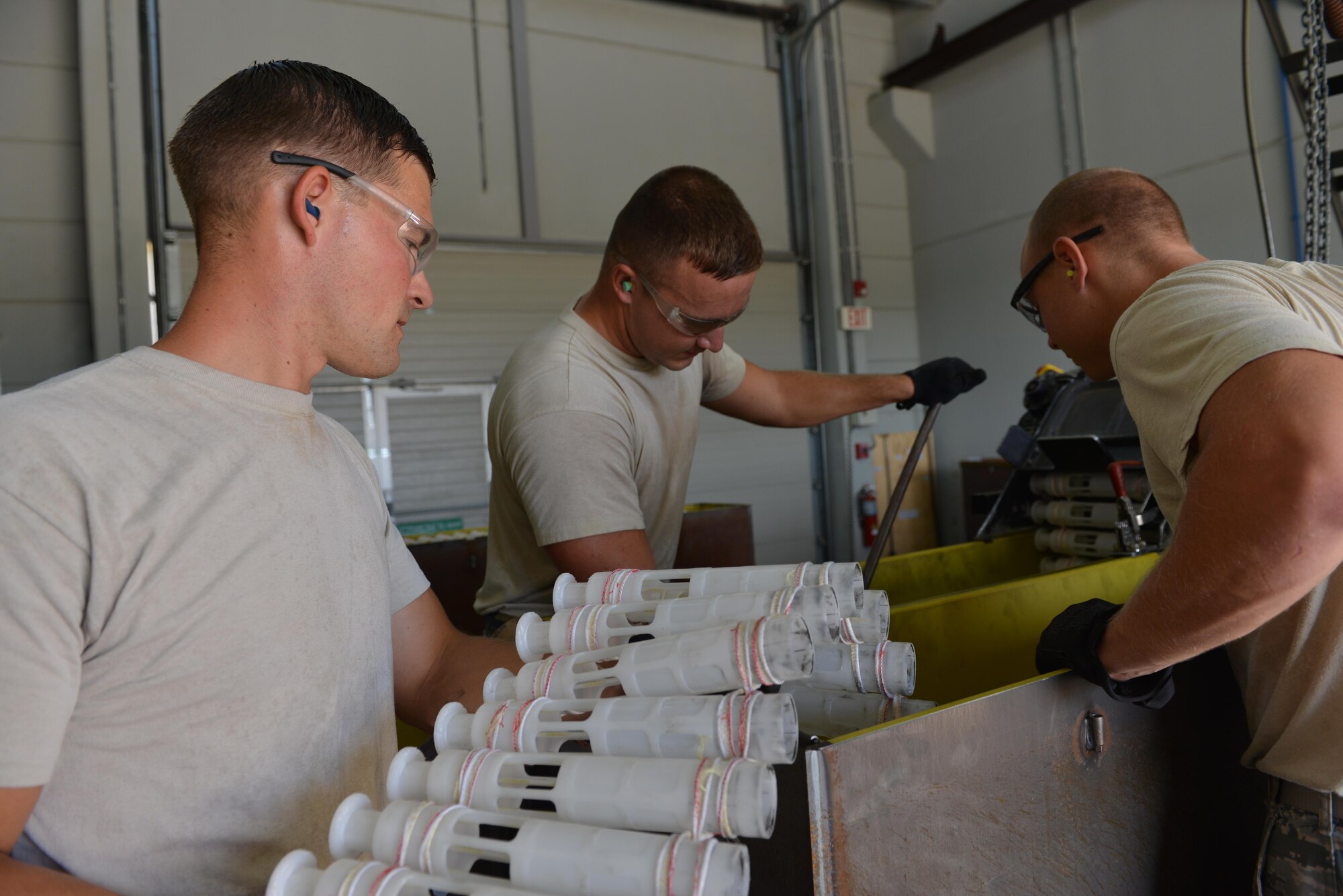 U.S. Airmen assigned to the 447th Expeditionary Aircraft Maintenance Squadron (EAMXS) process 30mm rounds Sept. 8, 2016, at Incirlik Air Base, Turkey. The 447th EAMXS supports Operation INHERENT RESOLVE by maintaining aircraft and supplying munitions. (U.S. Air Force photo by Senior Airman John Nieves Camacho)