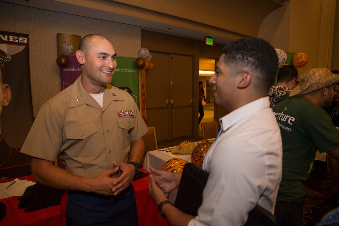 Capt. Chris Tamayo, Recruiting Support Officer, interviews students for the Hispanic Engineering National Achievement Award Conference College Bowl at the Great Minds in STEM HENAAC in Anaheim, Calif., Oct. 6, 2016. During the conference Marines interact with collegiate-level students from across the country, all which have a Hispanic heritage, and have shown outstanding qualities in education and leadership. (U.S. Marine Corps Photo by Sgt. Taylor Morton/Released)