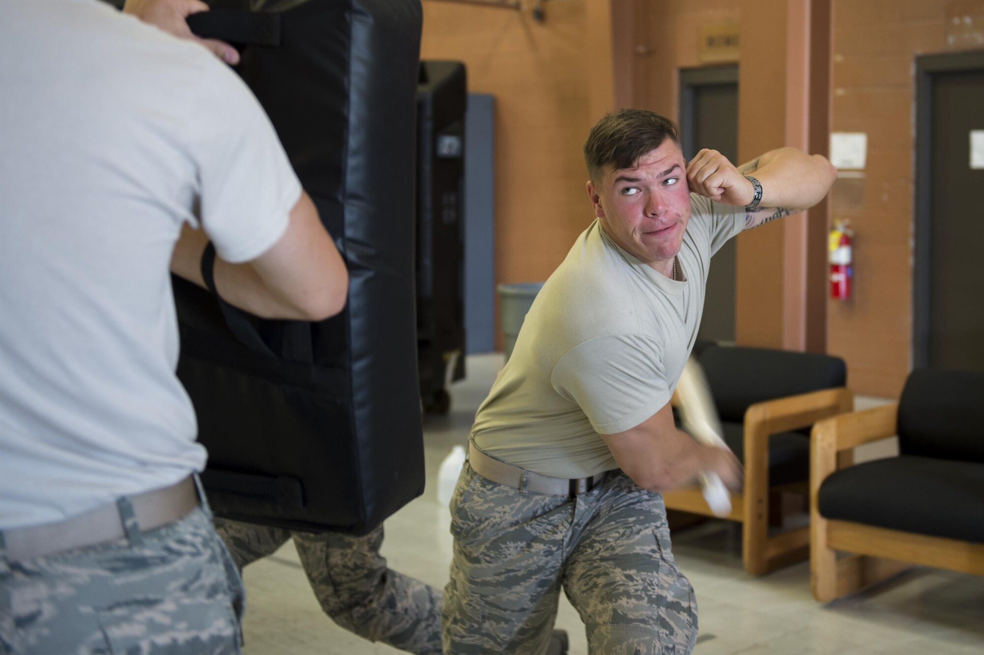Airman 1st Class Nicholas O'Brien, 105th Base Defense Squadron security forces member, strikes a bag during baton training, Sept. 28, 2016, at Moody Air Force Base, Ga. The 820th Base Defense Group trained with the 105th BDS for more than a month before leaving for their deployments to Southwest Asia. (U.S. Air Force photo by Tech. Sgt. Zachary Wolf)