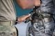 Tech. Sgt. Jose DeLeon, 820th Combat Operations Squadron NCO in charge of deployed radio frequency systems, checks a 105th Base Defense Squadron member’s harness during rappel training, Sept. 29, 2016, at Moody Air Force Base, Ga. The 820th Base Defense Group was able to use its post-deployment experience and training resources to help train the Air National Guardsmen of the 105th BDS. (U.S. Air Force photo by Tech. Sgt. Zachary Wolf)