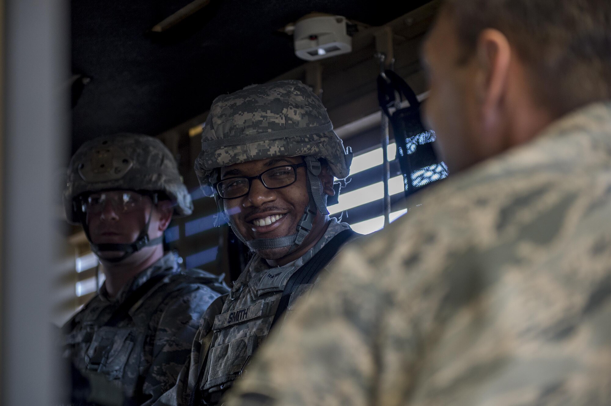 Airman 1st Class Vinson Smith, 105th Base Defense Squadron security forces member, smiles as he prepares for rollover training, Sept. 30, 2016, at Moody Air Force Base, Ga. While at Moody, members of the 105th BDS were able to train on an array of weapon systems as well as earn their license to drive mine-resistant, ambush-protected vehicles, also known as MRAPs. (U.S. Air Force photo by Tech. Sgt. Zachary Wolf)