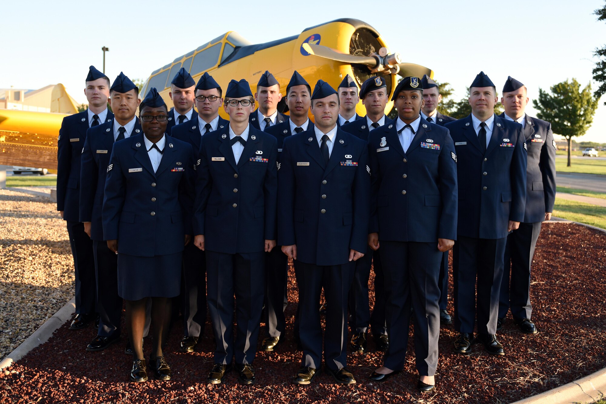 Airman leadership school class 16-F stands before a static plane display on Goodfellow Air Force Base, Texas, Oct. 11, 2016. ALS is a 6-week course designed to prepare senior airmen to assume supervisory duties, offering instruction in the practice of leadership and followership, written and oral communicative skills, and the profession of arms. (U.S. Air Force photo by Airman 1st Class Caelynn Ferguson/Released)