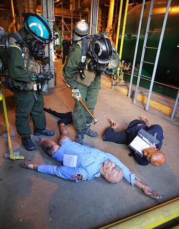 RANDALL’S ISLAND, N.Y. – Marines with Identification and Detection Platoon, IDP, and Technical Rescue Platoon, part of the primary assessment team, Chemical Biological Incident Response Force, CBIRF, locate and assess casualties found at a steam plant during a training exercise with the Fire Department of New York, FDNY, on Randall’s Island, N.Y., Sept. 15, 2016. CBIRF’s Marines and sailors participated in a training event that included three days of lane training with FDNY instructors teaching classes in vehicle extrication, breaching, rope rescue and medical as part of urban rescue operations, and a final training operation in which CBIRF responded to a notional steam plant explosion. (Official U.S. Marine Corps photo by Lance Cpl. Maverick S. Mejia/RELEASED)
