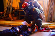 Marines with Search and Extraction Platoon, Chemical Biological Incident Response Force, CBIRF, extracted numerous casualties as part of a final training exercise with the Fire Department of New York, FDNY, on Randall’s Island, N.Y., Sept. 15, 2016. CBIRF’s Marines and sailors participated in a training event that included three days of lane training with FDNY instructors teaching classes in vehicle extrication, breaching, rope rescue and medical as part of urban rescue operations, and a final training operation in which CBIRF responded to a notional steam plant explosion. (Official U.S. Marine Corps photo by Lance Cpl. Maverick S. Mejia/RELEASED)

