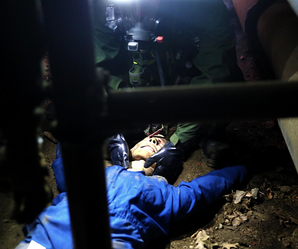 Marines with Search and Extraction Platoon, Chemical Biological Incident Response Force, CBIRF, extracted numerous casualties as part of a final training exercise with the Fire Department of New York, FDNY, on Randall’s Island, N.Y., Sept. 15, 2016. CBIRF’s Marines and sailors participated in a training event that included three days of lane training with FDNY instructors teaching classes in vehicle extrication, breaching, rope rescue and medical as part of urban rescue operations, and a final training operation in which CBIRF responded to a notional steam plant explosion. (Official U.S. Marine Corps photo by Lance Cpl. Maverick S. Mejia/RELEASED)
