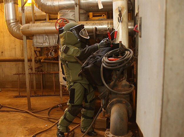RANDALL’S ISLAND, N.Y. – Marines with Explosive Ordnance Disposal, EOD, platoon, Chemical Biological Incident Response Force, CBIRF, participate in a final training exercise with Fire Department of New York, FDNY, responding to and deactivating a notional explosive threat found at a steam plant on Randall’s Island, N.Y., Sept. 15, 2016. CBIRF’s Marines and sailors participated in a training event that included three days of lane training with FDNY instructors teaching classes in vehicle extrication, breaching, rope rescue and medical as part of urban rescue operations, and a final training operation in which CBIRF responded to a notional steam plant explosion. (Official U.S. Marine Corps photo by Lance Cpl. Maverick S. Mejia/RELEASED)
