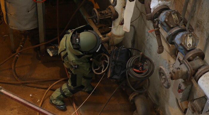 Marines with Explosive Ordnance Disposal, EOD, platoon, Chemical Biological Incident Response Force, CBIRF, participate in a final training exercise with Fire Department of New York, FDNY, responding to and deactivating a notional explosive threat found at a steam plant on Randall’s Island, N.Y., Sept. 15, 2016. CBIRF’s Marines and sailors participated in a training event that included three days of lane training with FDNY instructors teaching classes in vehicle extrication, breaching, rope rescue and medical as part of urban rescue operations, and a final training operation in which CBIRF responded to a notional steam plant explosion. (Official U.S. Marine Corps photo by Lance Cpl. Maverick S. Mejia/RELEASED)
