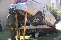 Marines with Technical Rescue Platoon, Chemical Biological Incident Response Force, CBIRF, rescues simulated casualties using vehicle extrication and high angle rescue techniques as part of a final training exercise with Fire Department of New York, FDNY, on Randall’s Island, N.Y., Sept. 15, 2016. CBIRF’s Marines and sailors participated in a training event that included three days of lane training with FDNY instructors teaching classes in vehicle extrication, breaching, rope rescue and medical as part of urban rescue operations, and a final training operation in which CBIRF responded to a notional steam plant explosion. (Official U.S. Marine Corps photo by Lance Cpl. Maverick S. Mejia/RELEASED)

