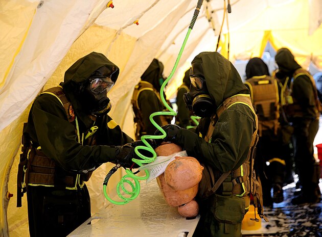 Marines with Decontamination Platoon, Chemical Biological Incident Response Force, CBIRF, participate in a final training exercise with Fire Department of New York, FDNY, decontaminating casualties that were extracted out of a steam plant at Randall’s Island, N.Y., on Sept. 15, 2016.
CBIRF’s Marines and sailors participated in a training event that included three days of lane training with FDNY instructors teaching classes in vehicle extrication, breaching, rope rescue and medial as part of urban rescue operations, and a final training operation in which CBIRF responded to a notional steam plant explosion. (Official U.S. Marine Corps photo by Lance Cpl. Maverick S. Mejia/RELEASED)

