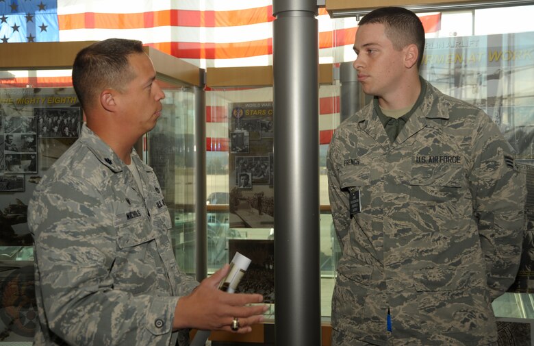 Lt. Col. George Nichols, 86th Civil Engineer Squadron commander, talks about Senior Airman Corey French’s extinguishing of a fire in base housing at Ramstein Air Base, Germany, Oct. 5, 2016. For his actions, which helped avoid massive damage to the housing unit, Nichols offered French the opportunity to be the grand marshal for the kickoff parade for Fire Prevention Week. (U.S. Air Force photo by Staff Sgt. Timothy Moore)