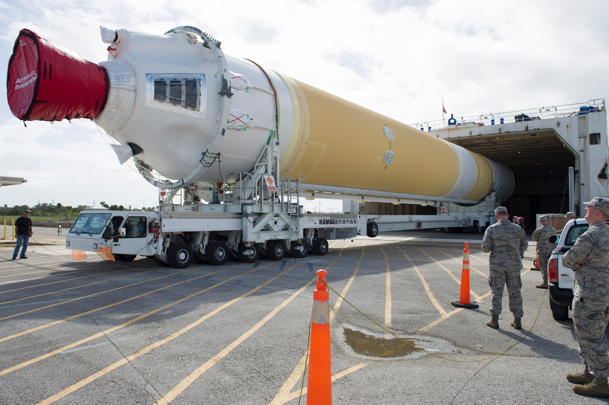 A team from the 45th Space Wing and contracted partners observe the arrival of the Mariner to the port at Cape Canaveral Air Force Station, Fla., Oct. 12, 2016. The large cargo ship transported United Launch Alliance’s vehicle hardware to the launch site at Cape Canaveral Air Force Station just a day after the base reopened following Hurricane Matthew. Ensuring 100 percent mission success, the 45th SW was able to recover and return to progressing forward with future launches. The Delta IV that arrived after the storm is expected to launch an Air Force Wideband Global SATCOM satellite later this year. (U.S. Air Force photo/Matthew Jurgens)