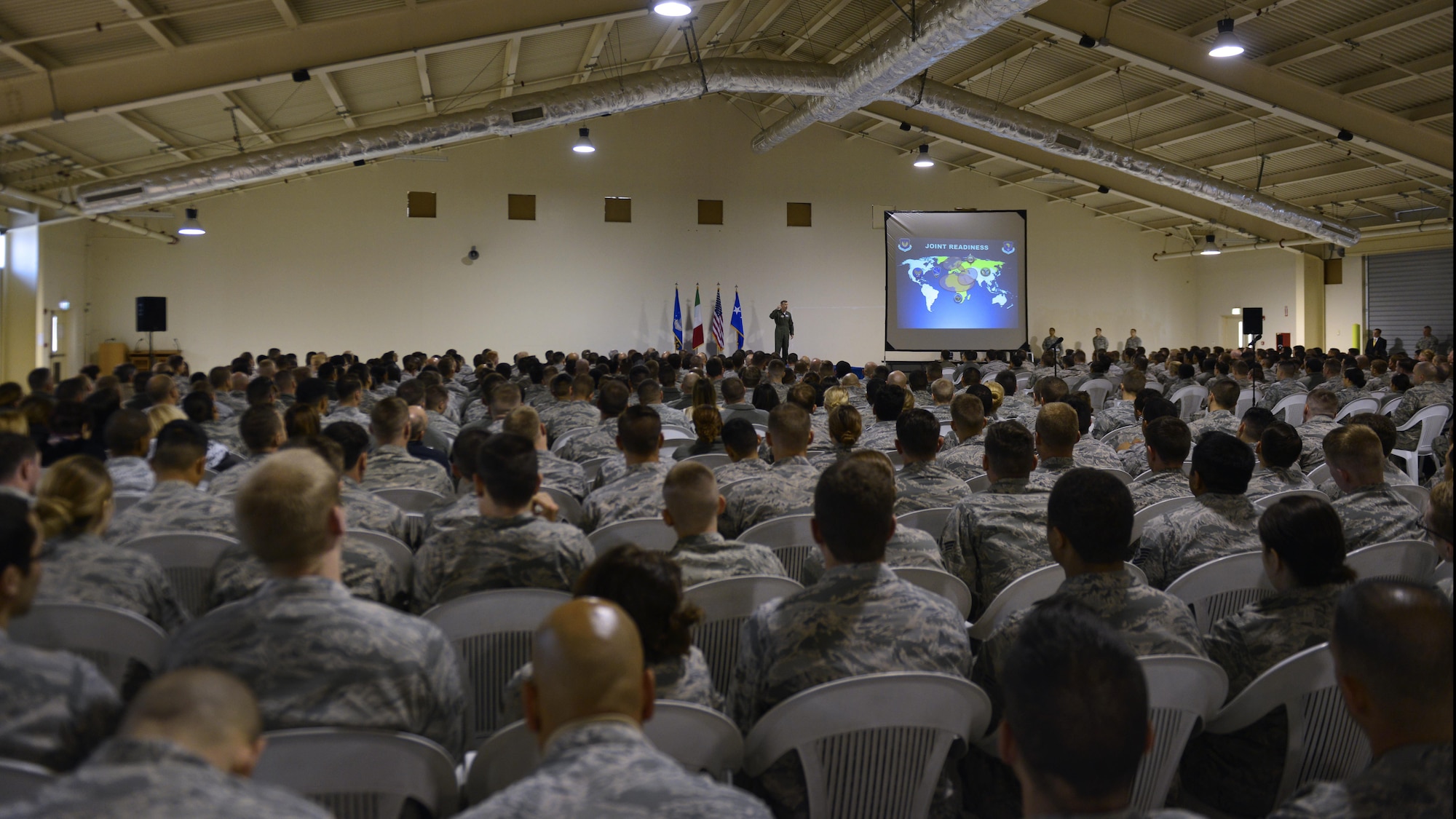 Gen. Tod D. Wolters, U.S. Air Forces in Europe - Air Forces Africa commander, speaks with Aviano Airmen on his mission priorities during his all call at Aviano Air Base, Italy on Oct. 13, 2016. Wolters spoke about trust, teamwork and training to achieve the Air Force mission. (U.S. Air Force photo by Airman 1st Class Cary Smith/Released)