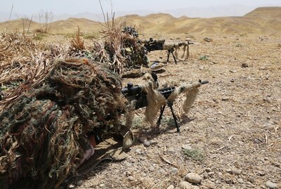 Peshmerga soldiers acquire targets by using the  scopes on their M14 Enhanced Battle Rifle during the sniper portion of a combined arms training exercise near Erbil, Iraq, July 26, 2016. The combined arms exercise allowed trainers to review the soldiers’ understanding of all the training conducted over the past several weeks during the modern brigade course. Combined Joint Task Force – Operation Inherent Resolve aims to enable and equip indigenous forces to take the Islamic State of Iraq and the Levant head on while leveraging Coalition nation airpower to halt the terrorist’s momentum. (U.S. Army photo by Sgt. Kalie Jones/Released)