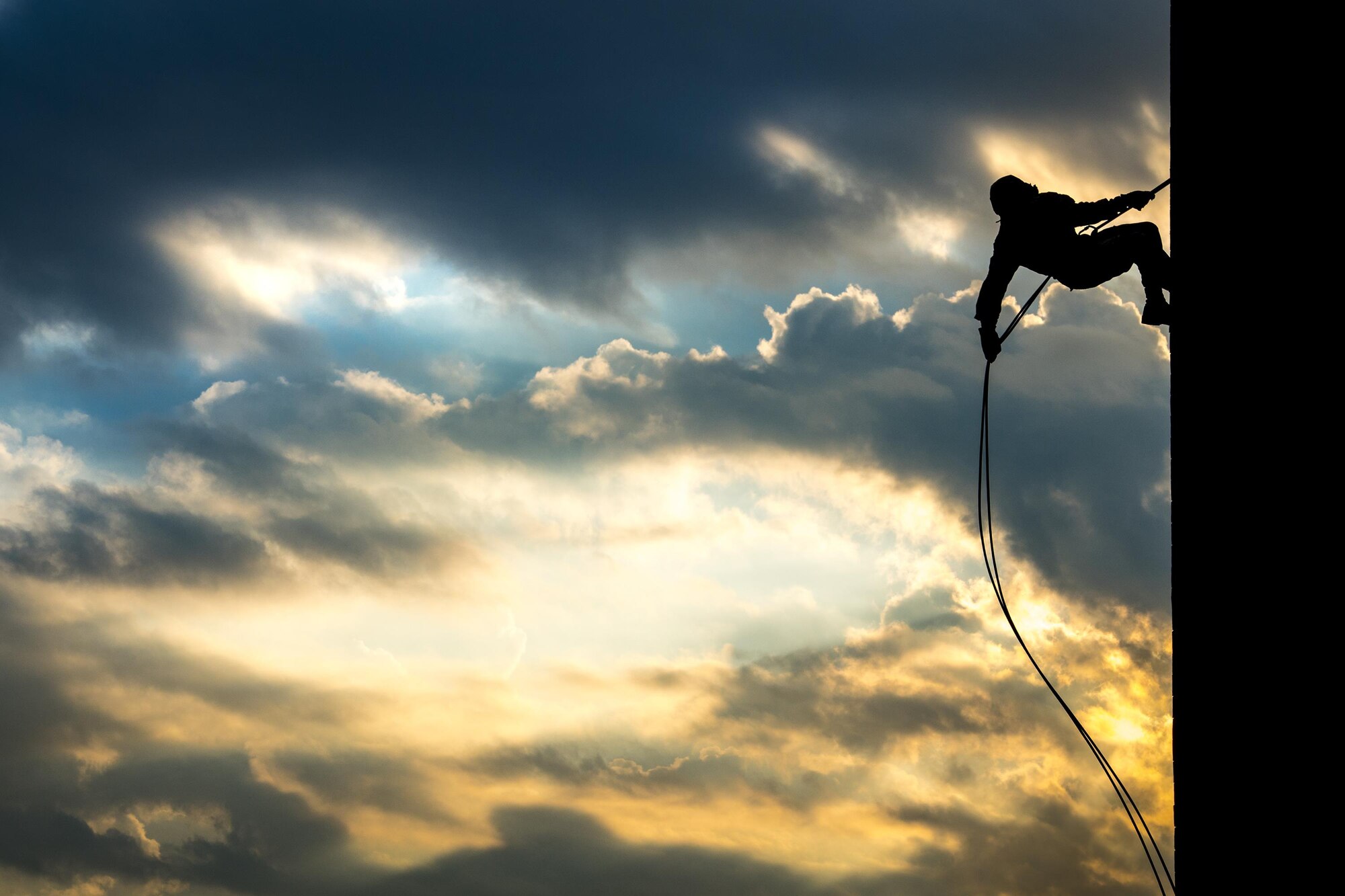 Staff Sgt. Tyler Hodge, 820th Combat Operations Squadron data systems technician, rappels during pre-deployment training, Sept. 29, 2016, at Moody Air Force Base, Ga. Each Airmen had to properly tie their own rope harness before conducting several rappels. (U.S. Air Force photo by Staff Sgt. Ryan Callaghan)
