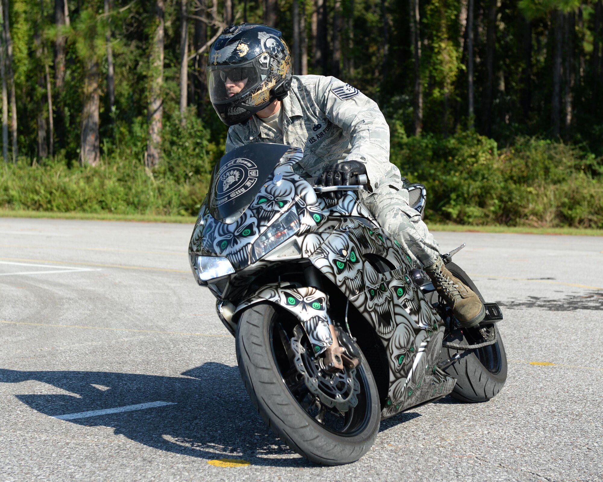 U.S. Air Force Tech. Sgt. Steven Johnson, 44th Fighter Group aircraft armaments systems technician, rides his motorcycle at Tyndall Air Force Base, Fla., Sept. 28, 2016. Johnson represents a small piece of the Total Force Integration puzzle, as he is an active-reserve technician who is critical in supporting Tyndall’s overall mission. (U.S. Air Force photo by Airman 1st Class Cody R. Miller/Released)