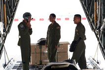 Philippine Air Force C-130 crew members prepare a U.S. Air Force C-130 Hercules aircraft for low-cost, low-altitude airdrop operations with U.S. Air Force Tech. Sgt. John Quiason (middle), 36th Airlift Squadron, 374th Airlift Wing, Yokota Air Base, Japan, during the current iteration of a rotational Air Contingent at Brigadier General Benito N Ebuen Air Base, Lapu-Lapu City, Philippines, Oct. 5, 2016. For the exchange, Yokota-based C-130s flew with members of the Philippine Air Force's 220th Airlift Wing, from Brig. Gen. Benito N. Ebuen Air Base, Lapu-Lapu City, Philippines, and discussed the intricacies of LCLA bundle drops. Two Yokota-based C-130s and crews, members of the 36th Contingency Response Group, Andersen Air Force Base, Guam, and other units from across U.S. Pacific Command conducted bilateral training missions and subject matter expert exchanges alongside their Philippine Air Force counterparts. The Air Contingent is helping build the capacity of the Philippine Air Force and increases joint training, promotes interoperability and provides greater and more transparent air and maritime situational awareness to ensure safety for military and civilian activities in international waters and airspace. Its missions include air and maritime domain awareness, personnel recovery, combating piracy, and assuring access to the air and maritime domains in accordance with international law. (U.S. Air Force photo by Capt. Mark Lazane)