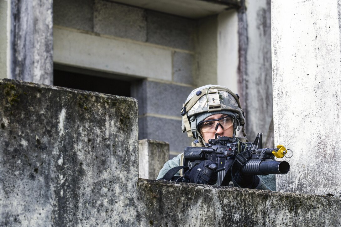 A soldier provides security during a simulated assault as part of Allied Spirit V at Hohenfels Training Area, Germany, Oct. 12, 2016. The U.S. Army Europe's three-week combat exercise includes more than 2,500 participants from eight NATO nations. Army photo by Pfc. Javon Spence