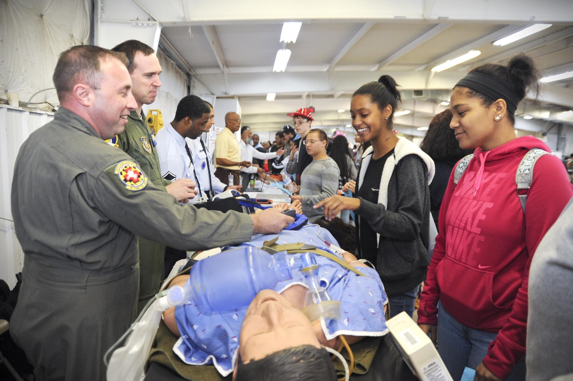 Members of the 459th Air Refueling Wing showcase their missions to a group of high school students at the Virginia Department of Transportation Career Fair in Manassas, Virginia, Thursday, Oct. 7, 2016. More than 1,400 students came out to talk with recruiters, a boom operator, aeromedical evacuation technician, and aeromedical staging squadron first sergeant about transportation-related careers in the Air Force Reserve and 459th ARW. (U.S.Air Force photo/Staff Sgt. Kat Justen)