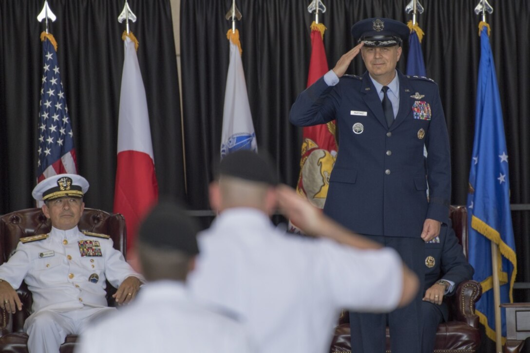 Lt. Gen. Jerry P. Martinez, United States Forces, Japan and 5th Air Force commander, returns his first salute from service members during the USFJ and 5th AF assumption of command ceremony at Yokota Air Base, Japan, Oct. 6, 2016. Martinez was the former director of operations, Headquarters Air Mobility Command, Scott Air Force Base. (U.S. Air Force photo by Yasuo Osakabe/Released) 