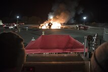 Airmen with the 35th Civil Engineer Squadron fire department use firetrucks to extinguish flames during an aircraft crash burn at Misawa Air Base, Japan, Oct. 12, 2016. Firetrucks can hold approximately 3,000 gallons of water and spray up to 750 gallons of water per minute. Firetrucks are also equipped with boom sticks, which are used to reach higher elevationd flames and can spray directly down on the fires. The demonstration is part of Misawa's Fire Prevention Week to showcase firefighitng tactics with the public. (U.S. Air Force photo by Airman 1st Class Sadie Colbert)