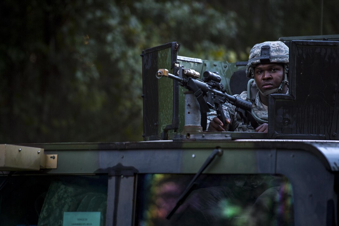 Senior Airman Jermain Mitchell, 105th Base Defense Squadron fireteam member, prepares for mounted patrol training, Sept. 27, 2016, at Moody Air Force Base, Ga. In addition to mounted and unmounted patrols, they also conducted heavy vehicle rollover training. (U.S. Air Force photo by Staff Sgt. Ryan Callaghan)
