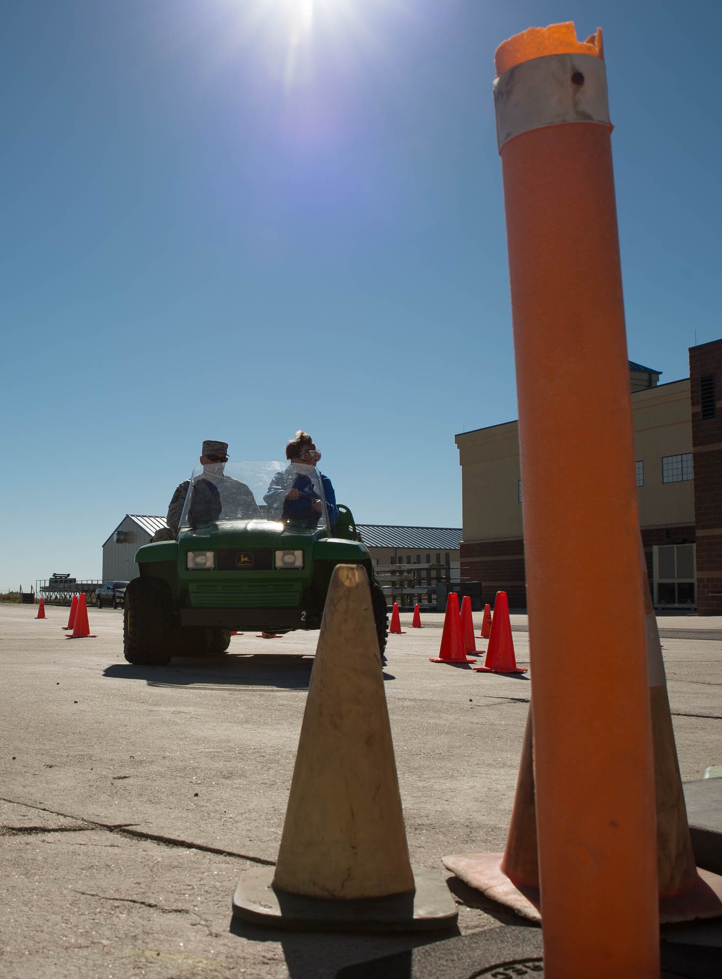 Senior Master Sgt. James Lambert, 153rd Airlift Wing Student Flight 
noncommissioned officer in charge, rides along side trainee Bailey Ammerman 
during a mock alcohol-impaired driving test Sept. 10, 2016, at the Wyoming Air 
National Guard Base in Cheyenne, Wyo. The training was intended for student 
flight trainees to experience, in a safe learning environment, what it might 
be like to drive while under the influence of alcohol. Students first drove 
the course with normal vision and then each donned beer goggles, which mimic 
the vision of an alcohol-impared driver. (U.S. Air National Guard photo by 
Master Sgt. Leisa Grant / Released)