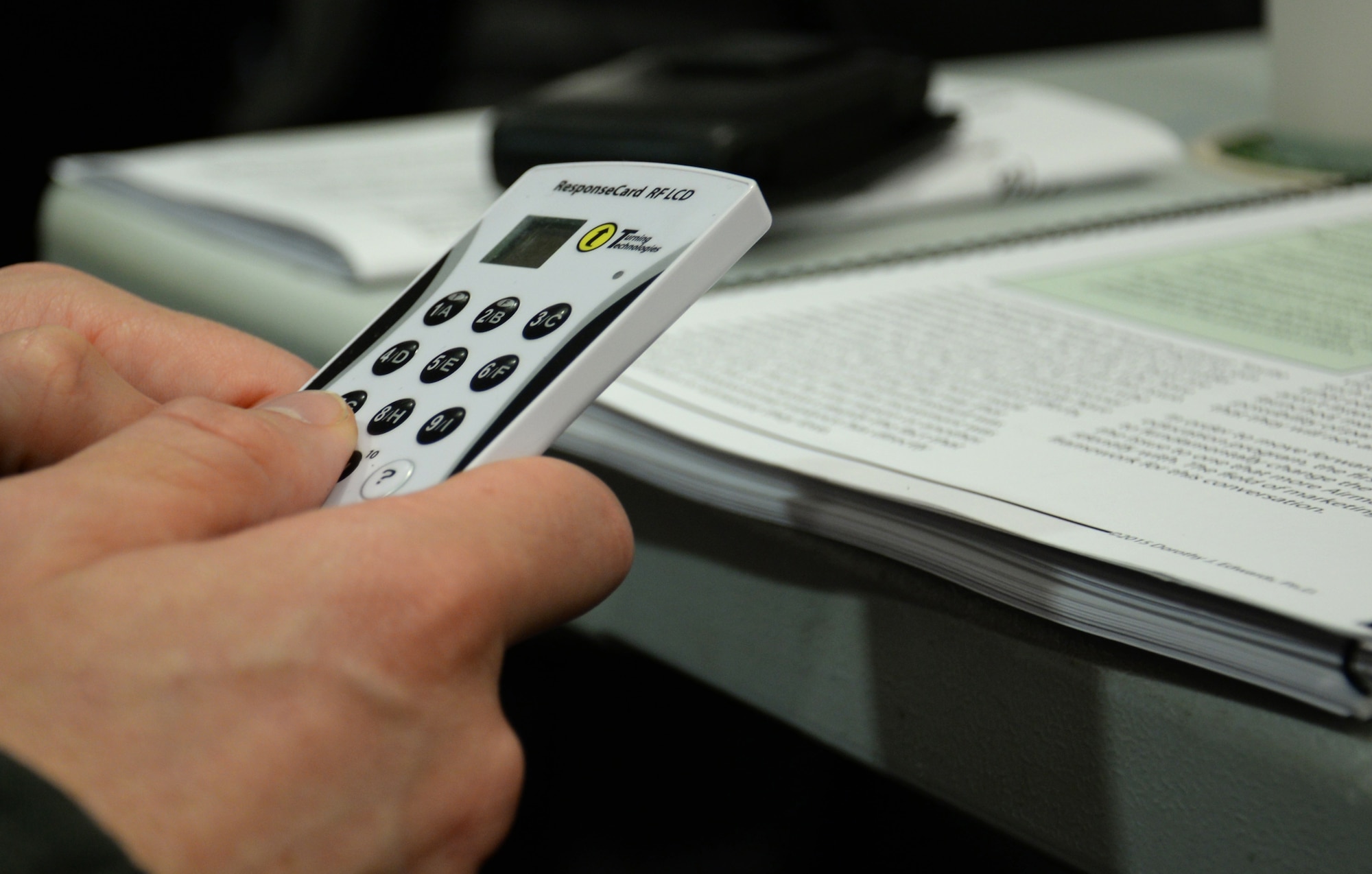 U.S. Air Force Airmen use clickers to express their views during a group topic in Green Dot training Oct. 11, 2016, on RAF Mildenhall, England. Green Dot equips Airmen with tools they can use to step in to prevent harm taking place. (U.S. Air Force photo by Gina Randall)