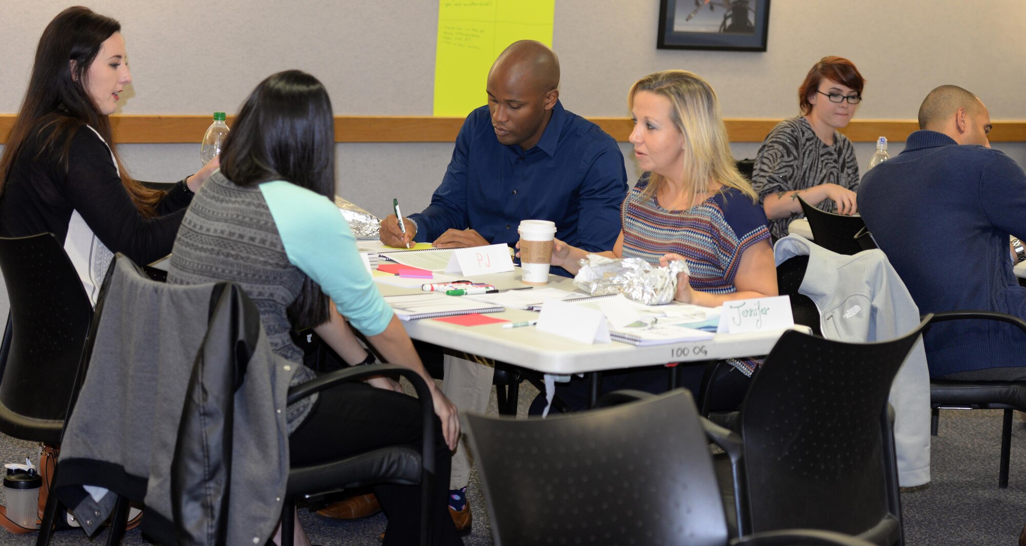 U.S. Air Force Airmen discuss a group topic during Green Dot training Oct. 11, 2016, on RAF Mildenhall, England. The Green Dot strategy is a comprehensive approach to sexual and domestic violence prevention. It focuses on the power of peer influence in society. (U.S. Air Force photo by Gina Randall)