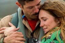 An Airman assigned to the 480th Expeditionary Fighter Squadron reunites with his wife during the squadron’s return to Spangdahlem Air Base, Germany, Oct. 6, 2016. Approximately 300 of the Airmen, who serve in flight, maintenance or support roles for the F-16 Fighting Falcon fighter aircraft, completed a six-month deployment to Southwest Asia by providing close air support and dynamic targeting operations as part of the squadron’s first deployment in support of Operation Inherent Resolve. Operation Inherent Resolve aims to eliminate the Da'esh terrorist group and the threat they pose to Iraq, Syria and the wider international community. (U.S. Air Force photo by Staff Sgt. Joe W. McFadden)