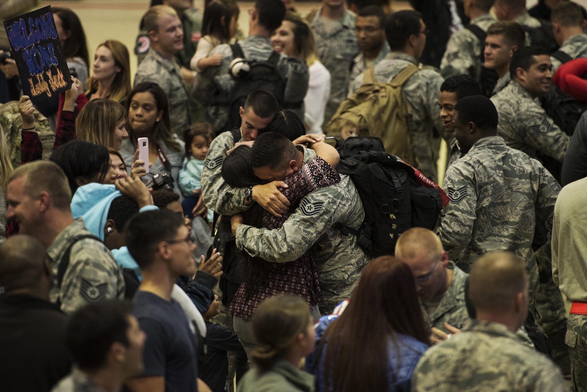 Airmen assigned to the 480th Expeditionary Fighter Squadron reunite with their loved ones during the squadron’s
return to Spangdahlem Air Base, Germany, Oct. 12, 2016. Approximately 300 of the squadron’s Airmen, who serve
in flight, maintenance or support roles for the F-16 Fighting Falcon fighter aircraft, completed a six-month
deployment to Southwest Asia by providing close air support and dynamic targeting operations in support of
Operation Inherent Resolve. (U.S. Air Force photo by Staff Sgt. Jonathan Snyder)