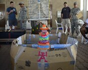 The 386th Expeditionary Civil Engineering Squadron’s boat sits at the base pool prior to a boat race Oct. 8, 2016 at an undisclosed location in Southwest Asia. Eleven boats were crafted and used to compete in Rockfest XV’s boat race where prizes were awarded for best design and fastest boat. (U.S. Air Force photo/Capt. Casey Osborne)