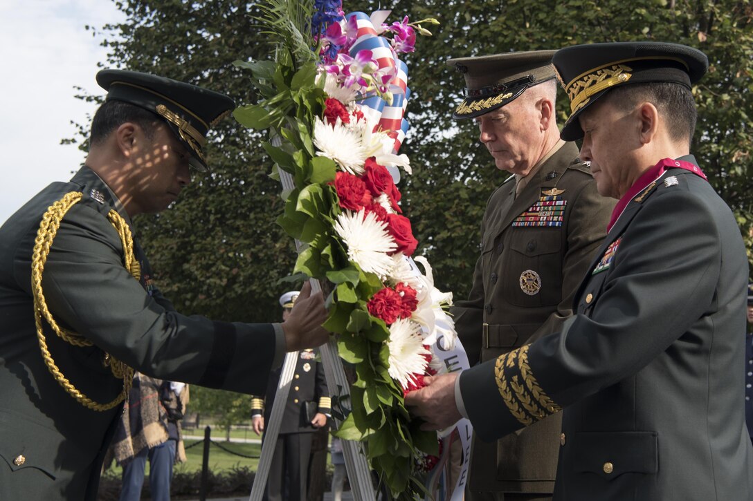 Marine Corps Gen. Joe Dunford, chairman of the Joint Chiefs of Staff, and his counterpart, South Korean Chairman Gen. Sun Jin Lee place a wreath at the Korean War Veterans Memorial in Washington, D.C., prior to the 41st Military Cooperation Meeting between the two countries at the Pentagon, Oct. 13, 2016. DoD photo by Navy Petty Officer 2nd Class Dominique A. Pineiro