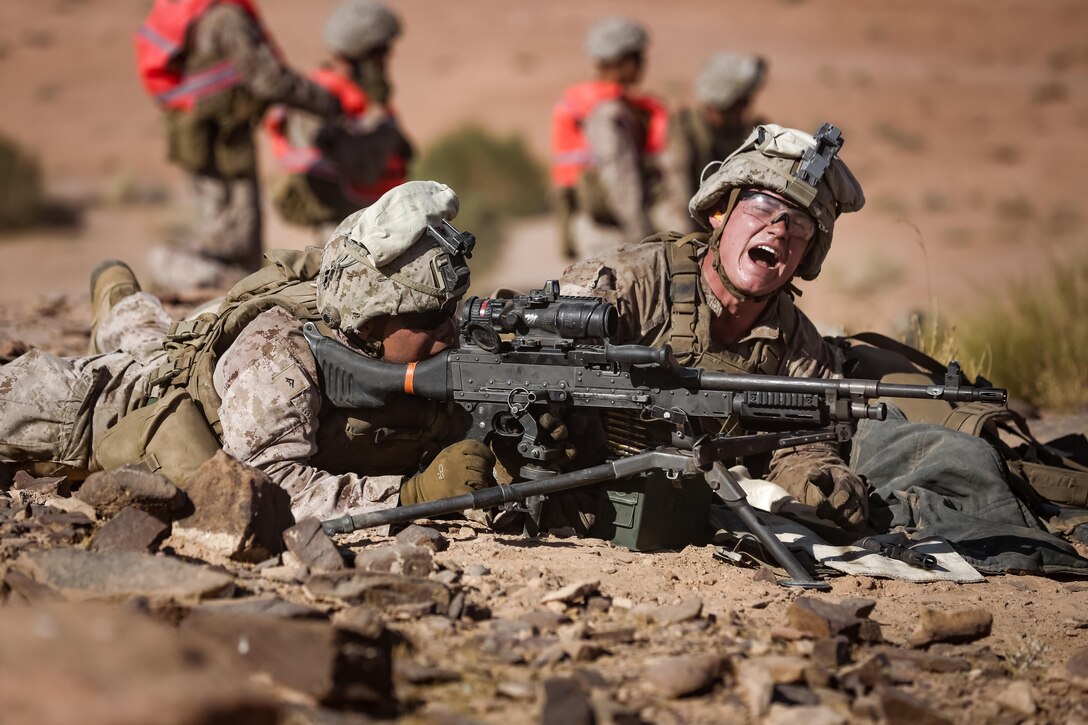 U.S. Marines with weapons platoon, Fox Company, 2nd Battalion, 7th Marine Regiment, Special Purpose Marine Air-Ground Task Force - Crisis Response - Central Command, conduct a live-fire raid training event during Mission Rehearsal Exercise 2016 in southern Jordan, Sept. 12, 2016. The MRX is a collective training event where the MAGTF elements collaborate to refine individual and cooperative capabilities. SPMAGTF - CR – CC is a self-sustaining expeditionary unit, designed to provide a broad range of crisis response capabilities throughout the Central Command area of responsibility, using organic aviation, logistical, and ground combat assets, to include embassy reinforcement and tactical recovery of aircraft and personnel. (U.S. Marine Corps photo by Cpl. Trever Statz/Released)