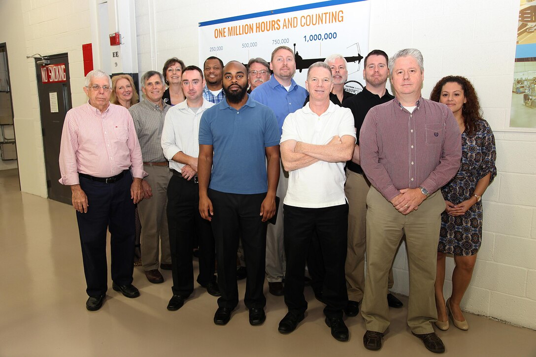 Defense Contract Management Agency Baltimore employees contributed to the RQ-7B Tactical Unmanned Aircraft System drone reaching one million total flight hours. Pictured in the back row are Brenda Lamka, Cindy Monius, Sheldon Quinn, Ken Tempel, Mike Taylor, Gene Dehart, Mike Fay and Liz Feliciano. In the front row are John Kamerosky, Ed Hoke, Matt Smardon, Arien Young, Matt Lewis and Rodney Putnam. (Courtesy photo)