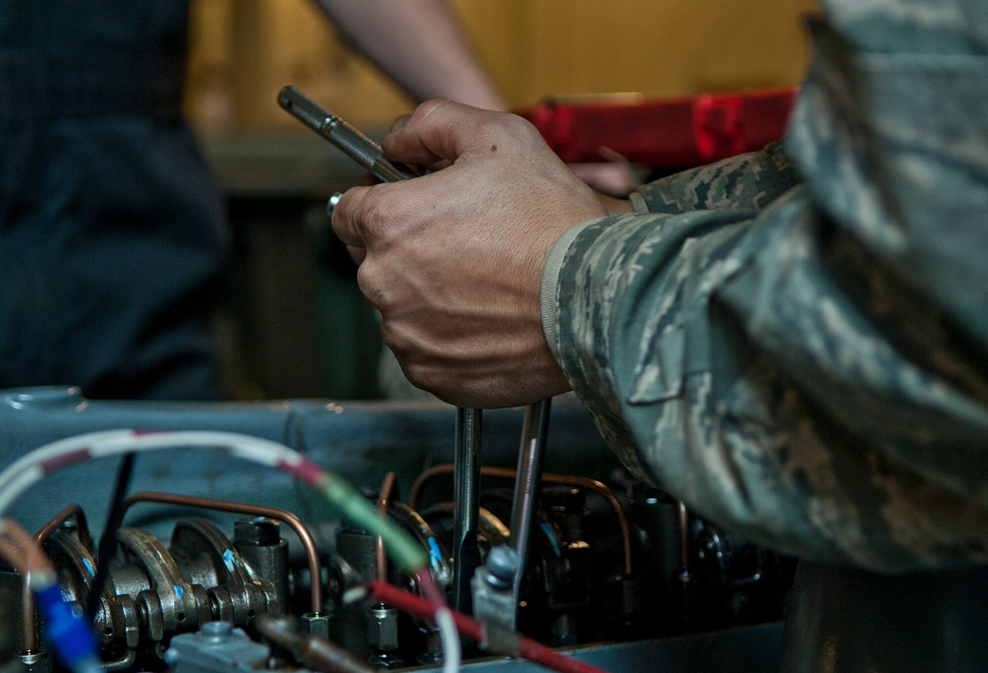 An aerospace ground equipment Airman with the 5th Maintenance Squadron performs a tune-up on an engine at Minot Air Force Base, N.D., Oct. 5, 2016. The AGE specialists ensure Minot AFB’s B-52H Stratofortress equipment is serviceable and ready for flight. (U.S. Air Force photo/Airman 1st Class Jonathan McElderry)