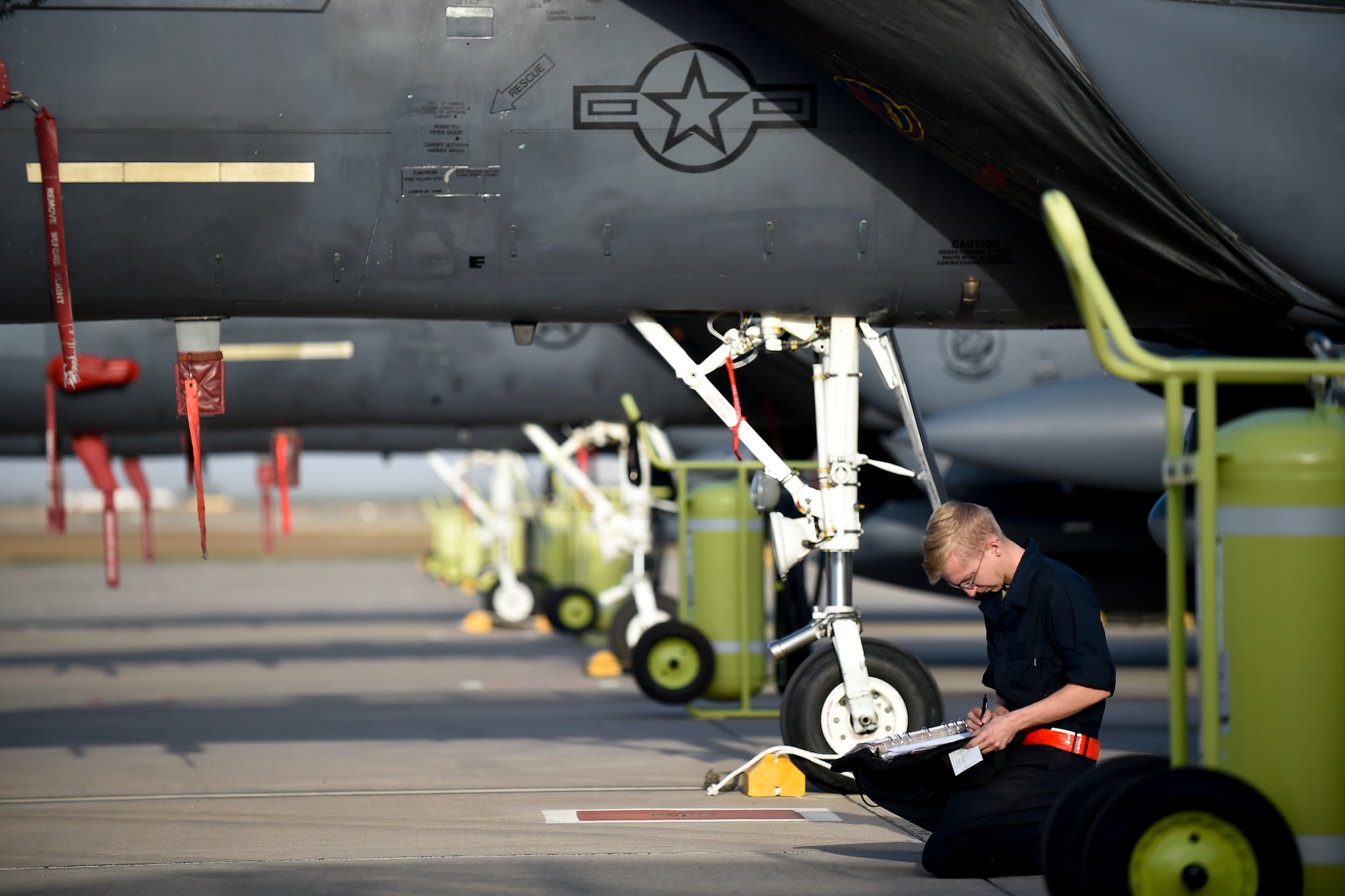 Senior Airman Dustyn Heilman, 389th Aircraft Maintenance Unit crew chief at Mountain Home Air Force Base, Idaho, prepares an F-15E Strike Eagle for takeoff at Morón Air Base, Spain, Oct. 4, 2016. With a unit of only 600 personnel, Airmen at Morón make up only 25 percent of that population. Team Morón is comprised of U.S. Airmen, Marines and Spanish air force members, who operate together to keep wheels off the ground and in the fight. The 496th Air Base Squadron, a geographically-separated unit from the 86th Airlift Wing, Ramstein Air Base, Germany, provides a worldwide platform for air power. (U.S. Air Force photo by Senior Airman Nicole Keim)
