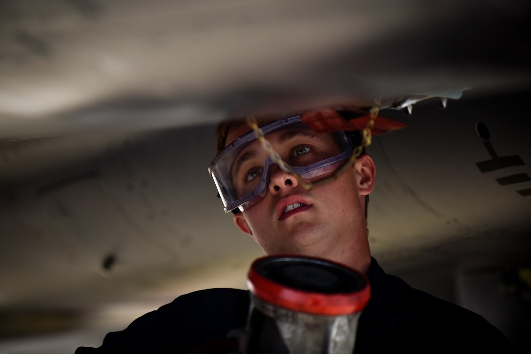 Senior Airman Andrew Parham, 389th Aircraft Maintenance Unit crew chief, at Mountain Home Air Force Base, Idaho, prepares an F-15E Strike Eagle for takeoff at Morón Air Base, Spain, Oct. 4, 2016. With a unit of only 600 personnel, Airmen at Morón make up only 25 percent of that population. Team Morón is comprised of U.S. Airmen, Marines and Spanish air force members, who operate together to keep wheels off the ground and in the fight. The 496th Air Base Squadron, a geographically-separated unit from the 86th Airlift Wing, Ramstein Air Base, Germany, provides a worldwide platform for air power. (U.S. Air Force photo by Senior Airman Nicole Keim)