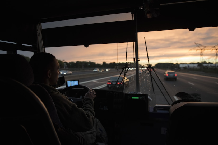 Airman Cody Charles, 11th Logistics Readiness Squadron vehicle operator, drives a charter bus on interstate 95 in New Jersey, Oct. 9, 2016. Charles was one of two 11th LRS drivers to assist the Air Force Honor Guard in their temporary duty to Boston. (U.S. Air Force photo by Senior Airman Philip Bryant)
