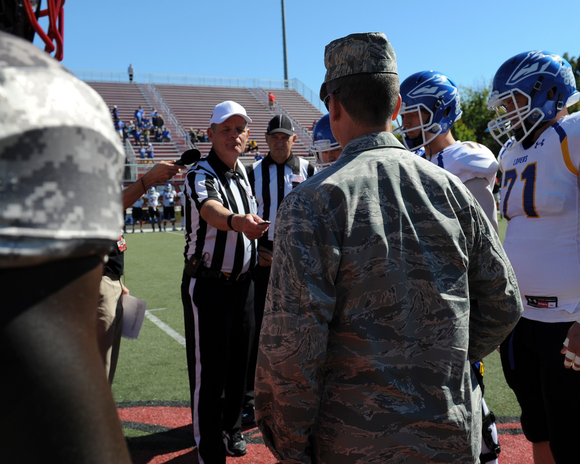 Hundreds of military families attended a free tailgate and game during Military Appreciation Day at the University of Central Missouri (UCM) in Warrensburg, Mo., Oct. 8, 2015. U.S. Air Force Brig. Gen. Paul W. Tibbets IV, thw 509th Bomb Wing commander, performed a coin toss before the start of the game. 