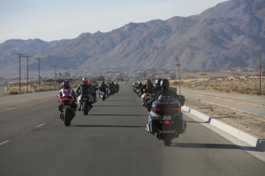 Riders taking part in the 3rd Annual Domestic Violence Awareness Poker Run Motorcycle Ride take off to their first stop at Luckie Park in Twentynine Palms, Calif., Oct. 7, 2016. (Official Marine Corps photo by Cpl. Thomas Mudd/Released)